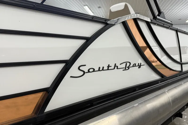 Slide: The Image of 2022 South Bay 523 UL boat, sleek design with elegant branding. - 10