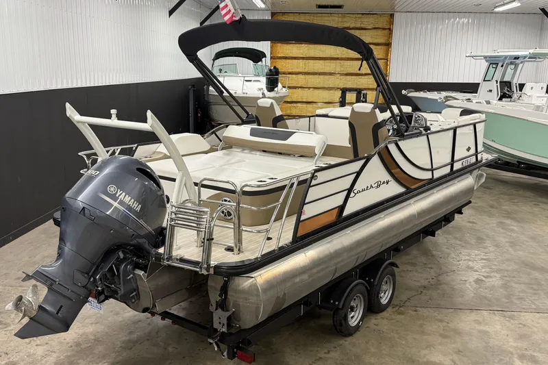 Slide: The Image of 2022 South Bay 523 UL pontoon boat with Yamaha engine in showroom. - 11