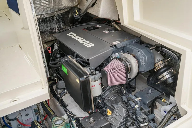 Slide: The Image of Engine compartment of 2014 Hinckley Talaria 34 with Yanmar engine visible. - 37