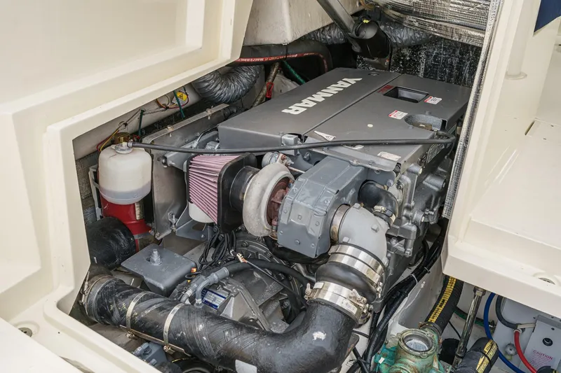 Slide: The Image of Engine compartment of 2014 Hinckley Talaria 34 with Yanmar engine visible. - 38