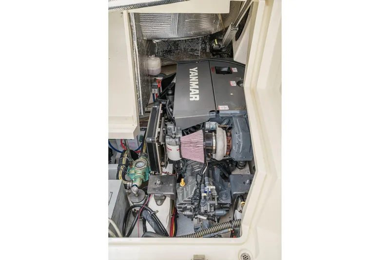Slide: The Image of Engine compartment of 2014 Hinckley Talaria 34 with Yanmar engine visible. - 39