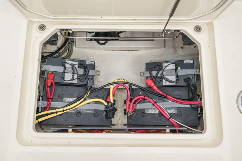 Slide: The Image of Battery compartment of 2014 Hinckley Talaria 34 with wiring and connections visible. - 40