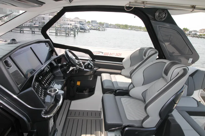 Slide: The Image of Interior of 2022 Galeon 325 GTO yacht with modern helm and luxury seating. - 17