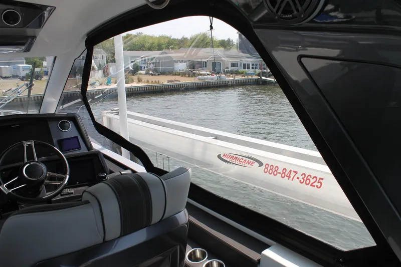Slide: The Image of Interior view of 2022 Galeon 325 GTO yacht, overlooking marina and docked boat. - 18