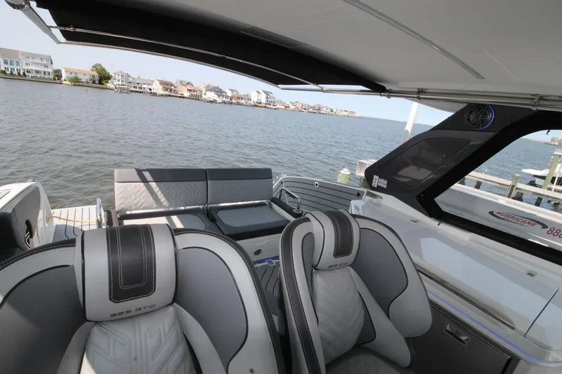 Slide: The Image of 2022 Galeon 325 GTO boat interior with luxurious seating and waterfront view. - 24