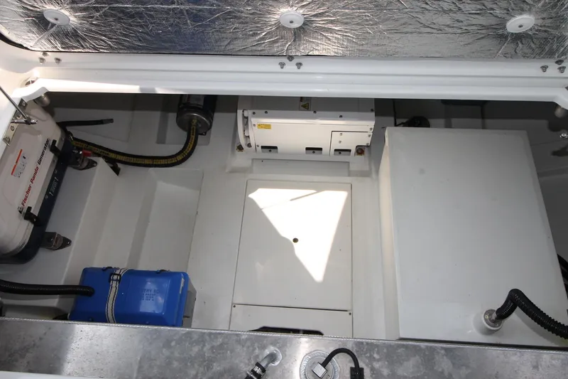 Slide: The Image of Engine compartment of 2022 Galeon 325 GTO, showcasing equipment and wiring layout. - 26