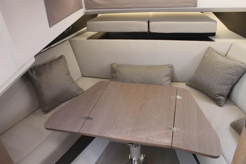 Slide: The Image of Luxurious interior of 2022 Galeon 325 GTO yacht with elegant seating and table. - 28