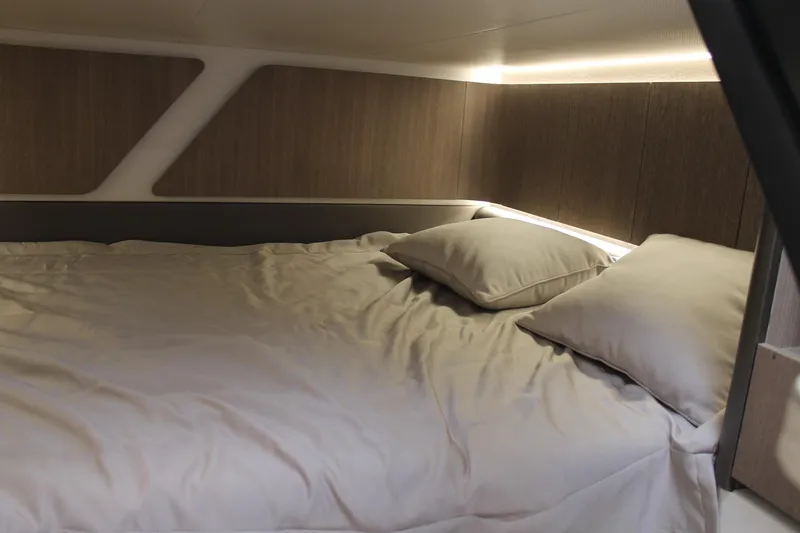Slide: The Image of Cozy cabin interior of 2022 Galeon 325 GTO yacht with comfortable bedding. - 29