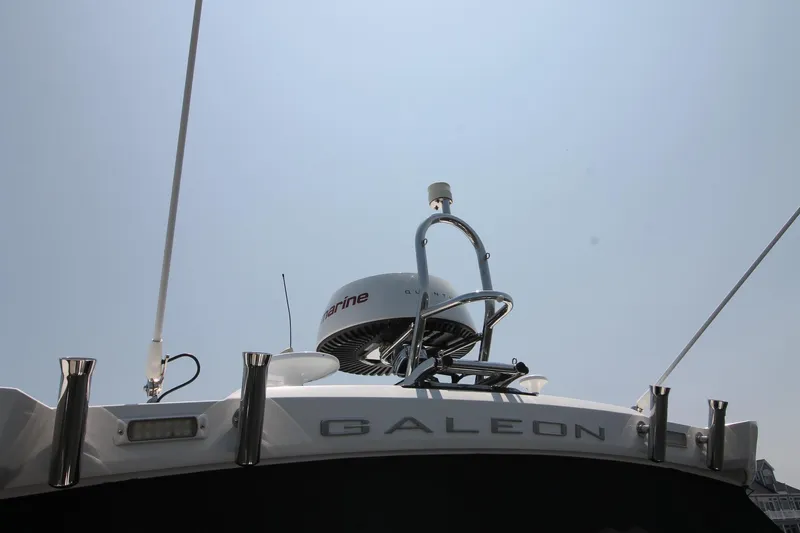 Slide: The Image of 2022 Galeon 325 GTO yacht with radar equipment against clear sky. - 3