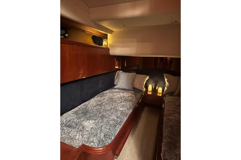 Slide: The Image of Luxurious cabin interior of 2001 Fairline 55 yacht with cozy twin beds. - 28