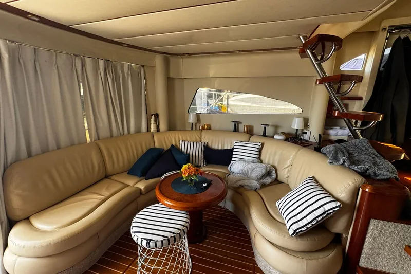 Slide: The Image of Luxurious 2001 Fairline 55 yacht interior with leather seating and elegant decor. - 36