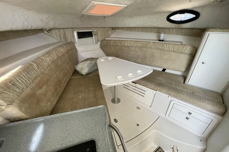 Slide: The Image of Interior cabin of 2002 Wellcraft 290 Coastal boat with seating and storage. - 20