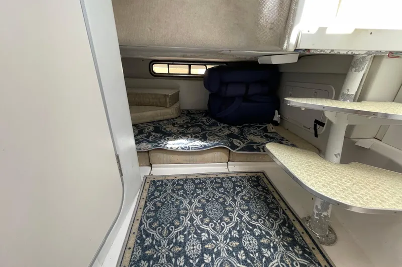 Slide: The Image of Interior of 2002 Wellcraft 290 Coastal boat with kitchenette and stairs. - 22