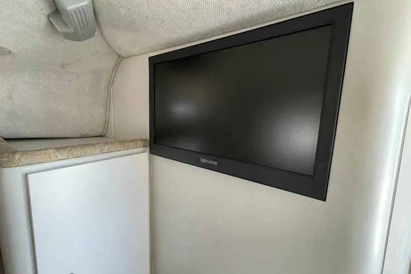 Slide: The Image of Flat-screen TV in 2002 Wellcraft 290 Coastal boat interior. - 25