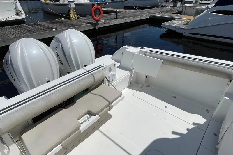 Slide: The Image of Electrical control panel on a 2002 Wellcraft 290 Coastal boat with Fusion stereo system. - 28