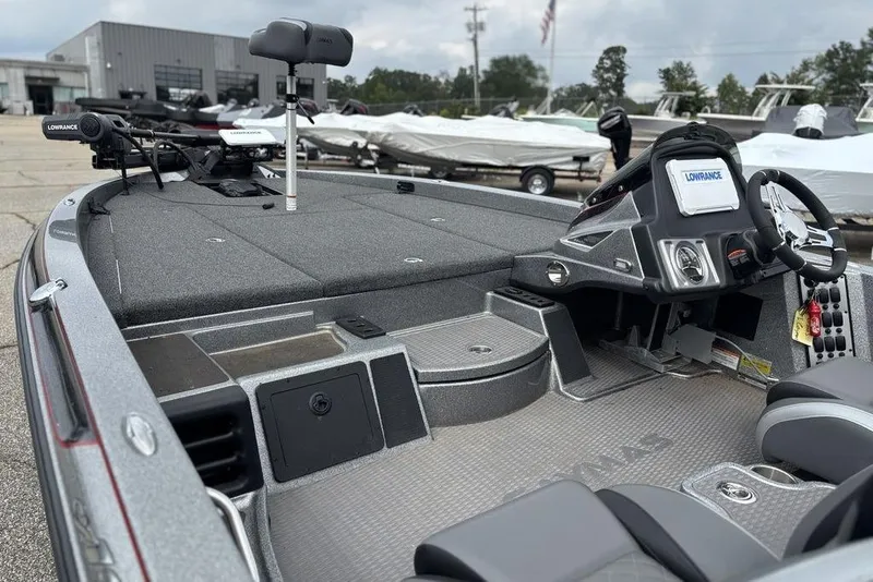 Slide: The Image of 2023 Caymas CX 19 boat interior with advanced navigation system and seating. - 8