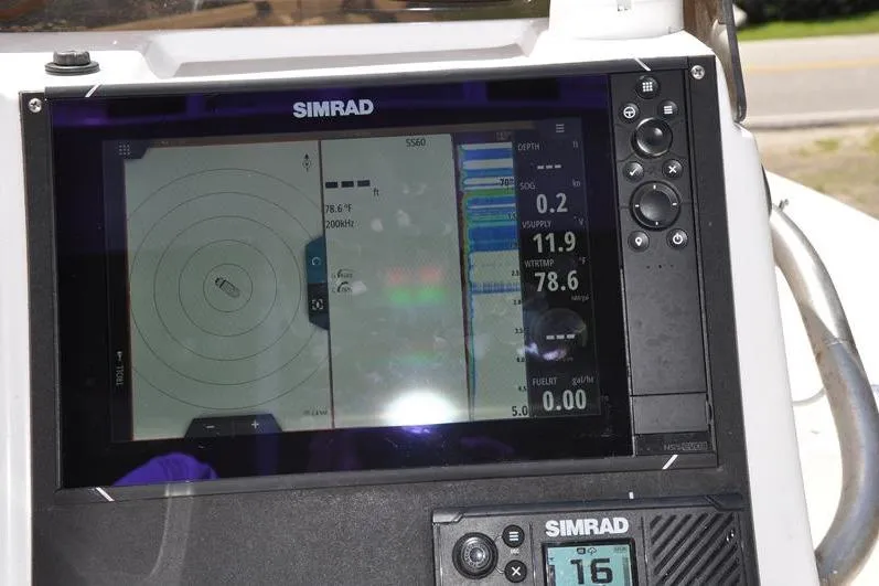 Slide: The Image of Simrad marine display on 2021 Sea Pro 228 Bay boat, showing navigation and depth data. - 20