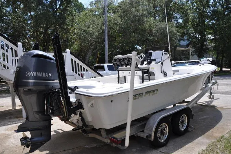 Slide: The Image of 2021 Sea Pro 228 Bay boat on trailer with Yamaha outboard motor. - 7