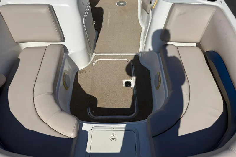 Slide: The Image of Interior seating of a 2013 Hurricane 188 boat with beige upholstery. - 11