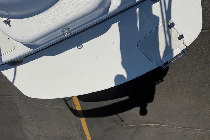 Slide: The Image of Top view of a 2013 Hurricane 188 boat with shadow on pavement. - 29