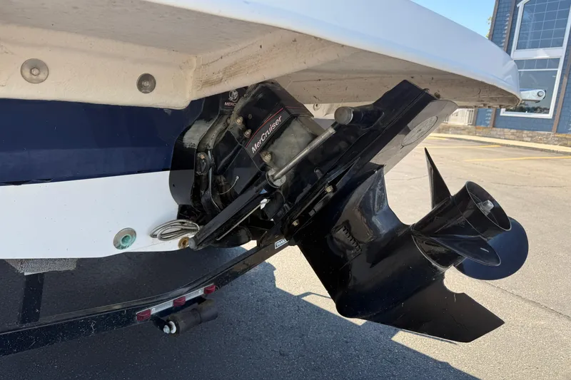 Slide: The Image of Close-up of a 2013 Hurricane 188 boat's MerCruiser outdrive and propeller. - 5