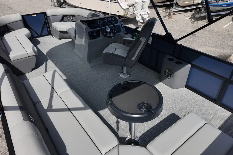 Slide: The Image of 2026 Viaggio Lago V 20 C boat interior with modern seating and steering console. - 14
