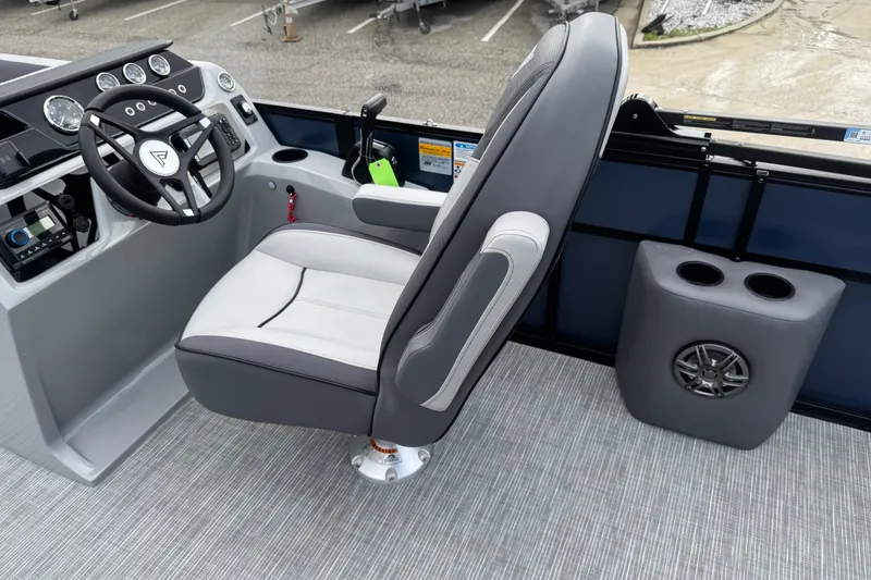 Slide: The Image of Captain's chair and dashboard of 2026 Viaggio Lago V 20 C boat interior. - 17