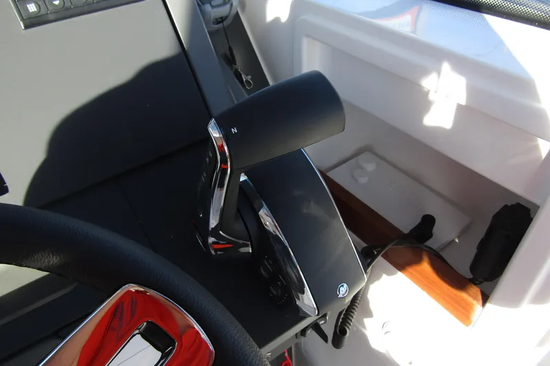 Slide: The Image of Control lever of 2025 Nimbus Tender 9 boat, featuring sleek design and modern technology. - 20