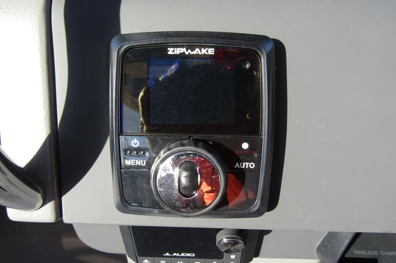 Slide: The Image of Control panel on 2025 Nimbus Tender 9 boat, featuring Zipwake system. - 18