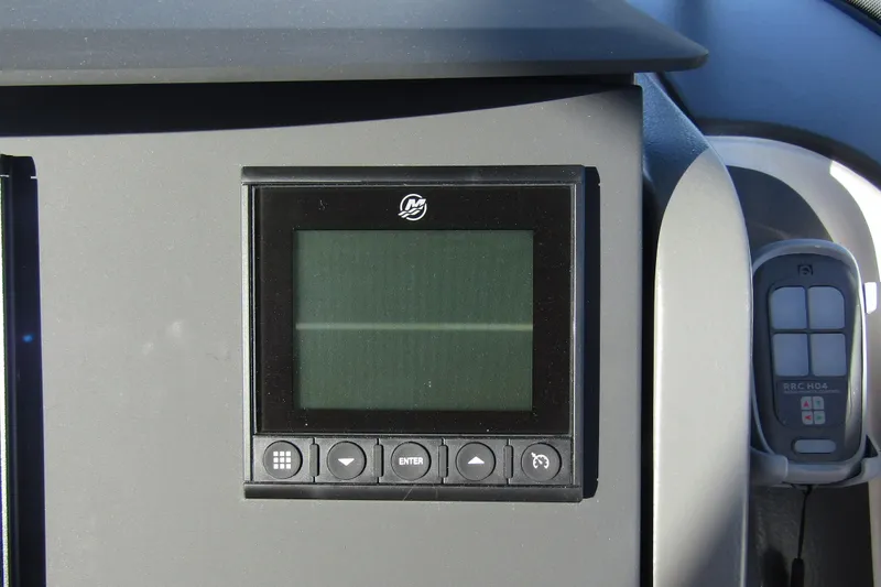 Slide: The Image of Control panel of 2025 Nimbus Tender 9 with display and buttons. - 16