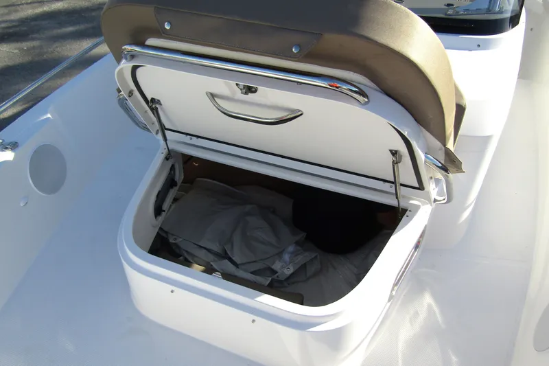 Slide: The Image of Open storage compartment on 2025 Nimbus Tender 9 boat, showcasing spacious interior. - 12