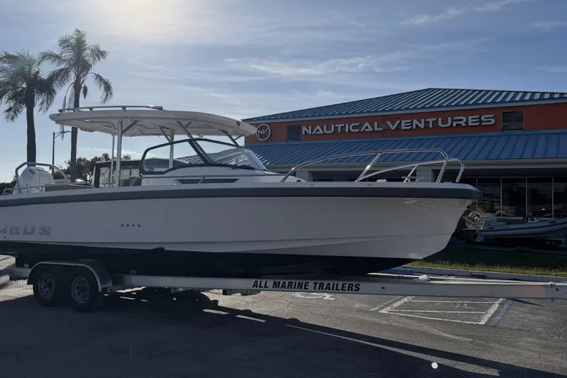Slide: The Image of 2025 Nimbus Tender 9 boat on trailer at Nautical Ventures dealership. - 6