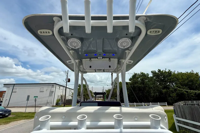 Slide: The Image of 2021 Sea Hunt BX 22 BR boat with T-top and rod holders, viewed from below. - 12