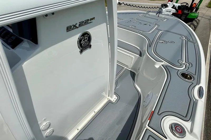 Slide: The Image of 2021 Sea Hunt BX 22 BR boat deck with 25th anniversary emblem. - 16