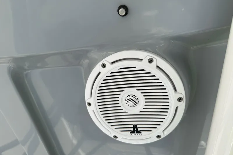 Slide: The Image of White JL Audio speaker on 2021 Sea Hunt BX 22 BR boat interior. - 21