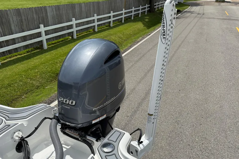 Slide: The Image of 2021 Sea Hunt BX 22 BR boat with Yamaha 200 four-stroke engine and Power-Pole anchor. - 22