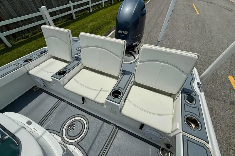 Slide: The Image of 2021 Sea Hunt BX 22 BR boat with white seating and Yamaha 200 engine. - 7