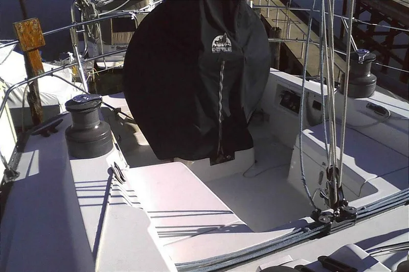 Slide: The Image of Cockpit of 1988 C&C 44 sailboat with winches and covered wheel. - 6