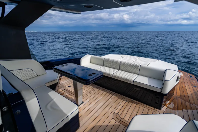 Slide: The Image of Luxurious seating area on a 2023 Maori 54 yacht with ocean view. - 21