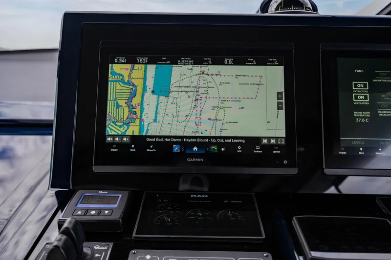 Slide: The Image of Navigation system on Maori 54 yacht, displaying a detailed marine map, 2023 model. - 32