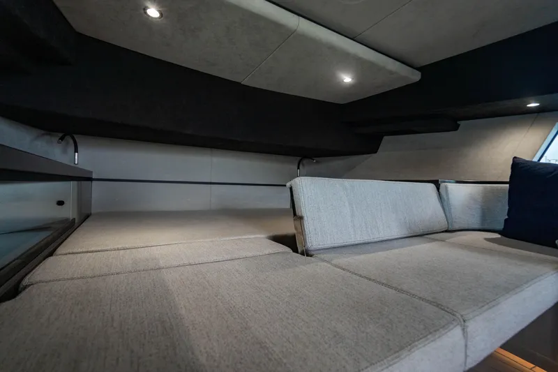 Slide: The Image of Luxurious interior of 2023 Maori 54 yacht with modern seating and ambient lighting. - 44