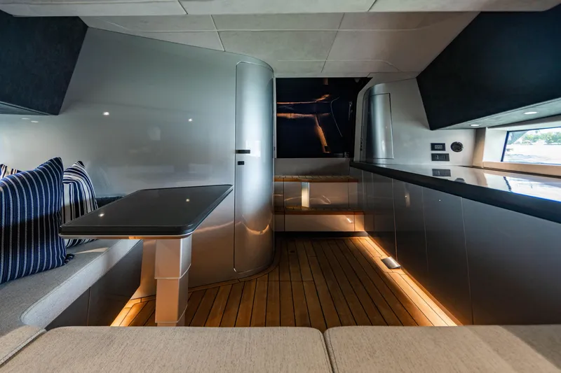 Slide: The Image of Luxurious interior of 2023 Maori 54 yacht with modern seating and sleek design. - 45
