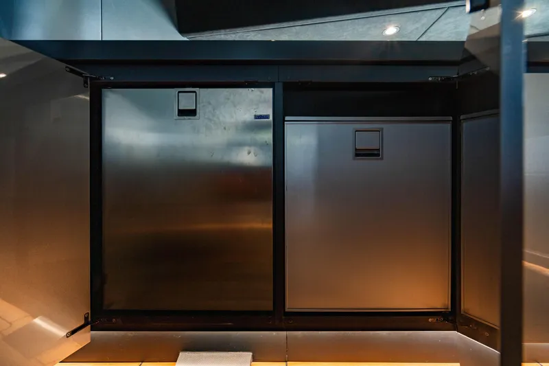 Slide: The Image of Modern kitchen appliances in a sleek, stainless steel design, Maori 54 model, 2023. - 47