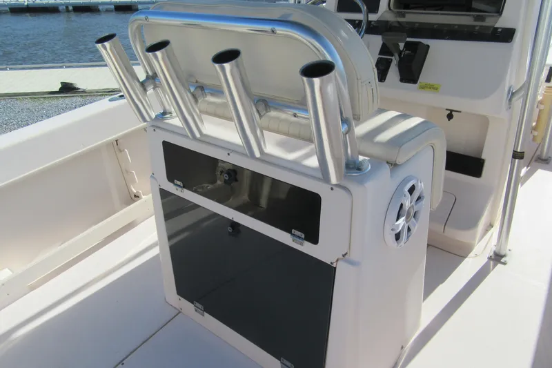 Slide: The Image of 2004 Grady-White Fisherman 222 boat interior with rod holders and seating. - 4