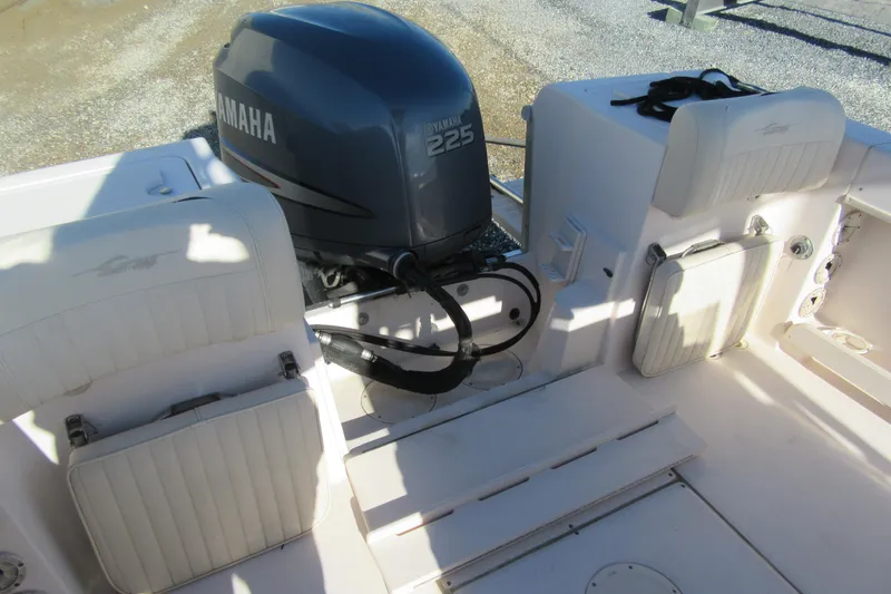 Slide: The Image of 2004 Grady-White Fisherman 222 boat with Yamaha 225 engine, featuring white seating. - 5
