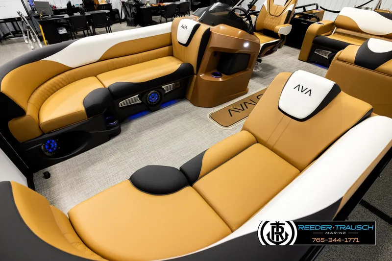 Slide: The Image of Luxurious interior of 2026 Avalon LSZ VRB pontoon boat with tan and black seating. - 10