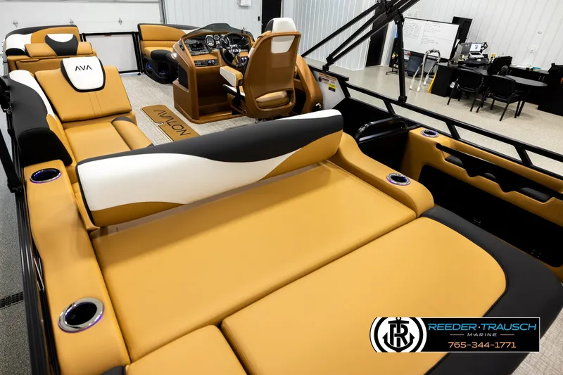 Slide: The Image of Luxurious interior of 2026 Avalon LSZ VRB boat with tan and white seating. - 11