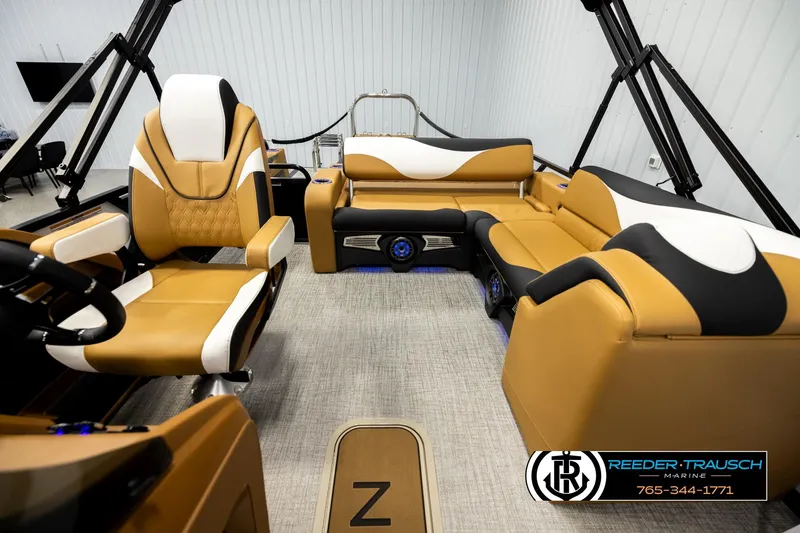 Slide: The Image of Luxurious interior of 2026 Avalon LSZ VRB boat with tan and black seating. - 14