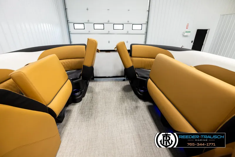 Slide: The Image of 2026 Avalon LSZ VRB boat interior with tan seating and modern design. - 19
