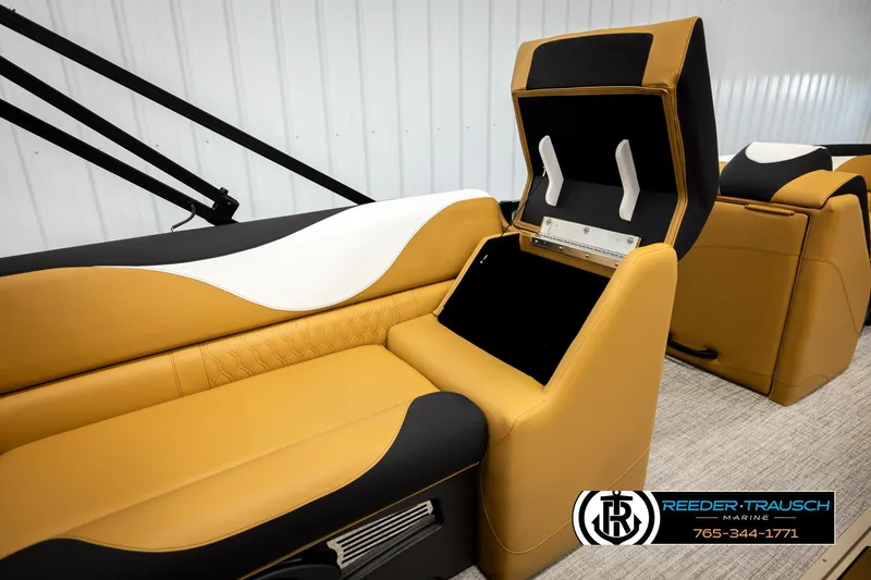 Slide: The Image of Luxurious seating in 2026 Avalon LSZ VRB boat with storage compartment open. - 21
